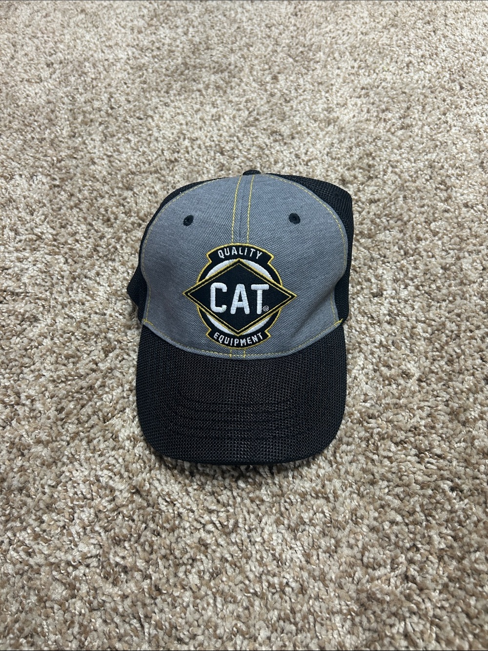 Caterpillar Gray and Black Logo Trucker Hat with Yellow Accent